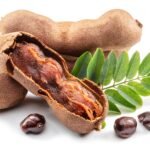 Ripe,Tamarind,Fruit,,Leaves,And,Some,Tamarind,Seeds,Isolated,On